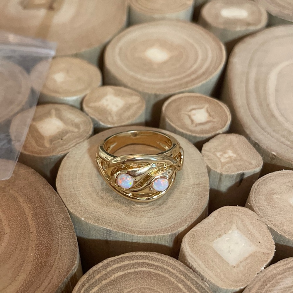 Five and Two Scattered Opal Oval Ring in Gold Plated Size 6